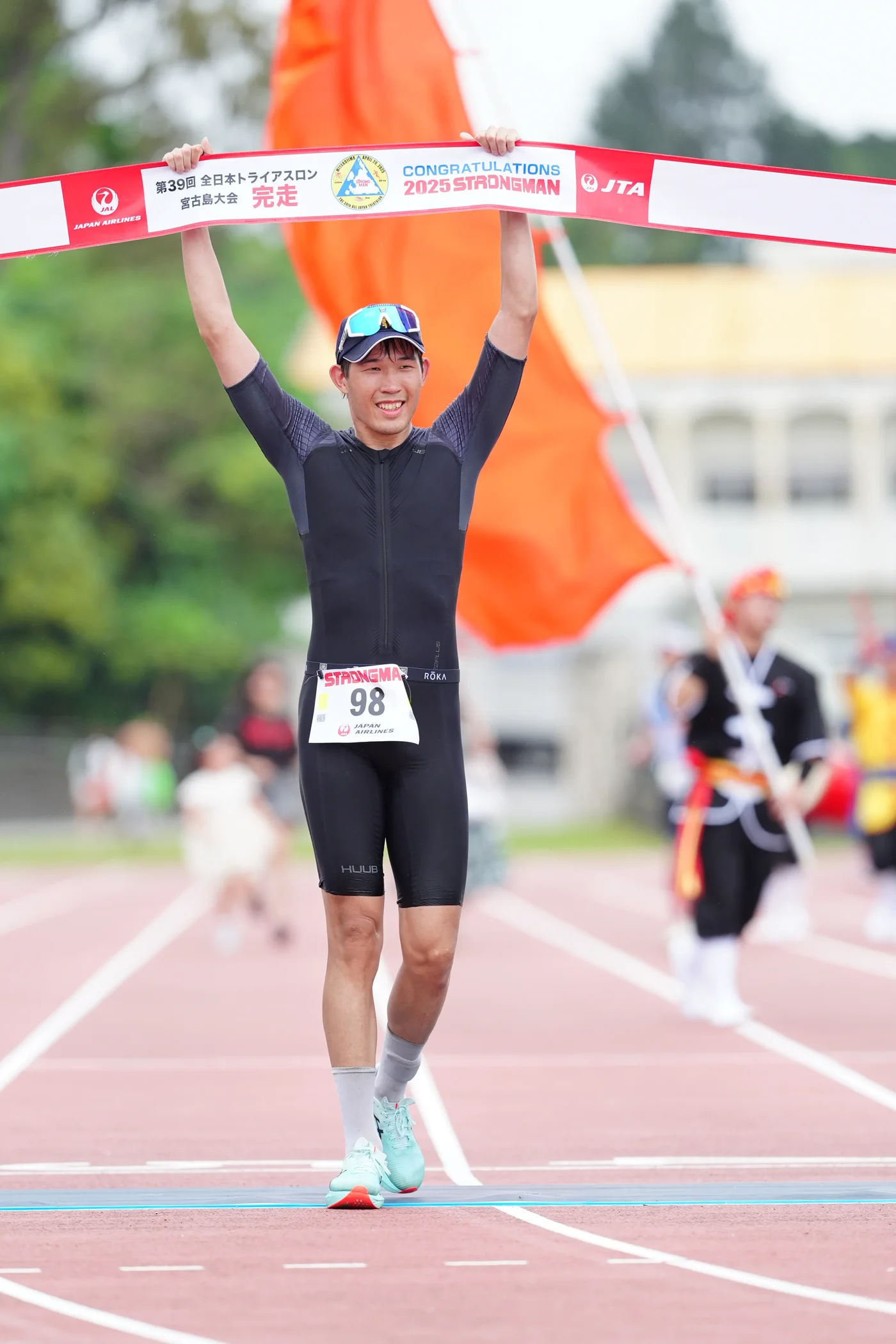 Crossing the finish line at the 39th Miyako Triathlon